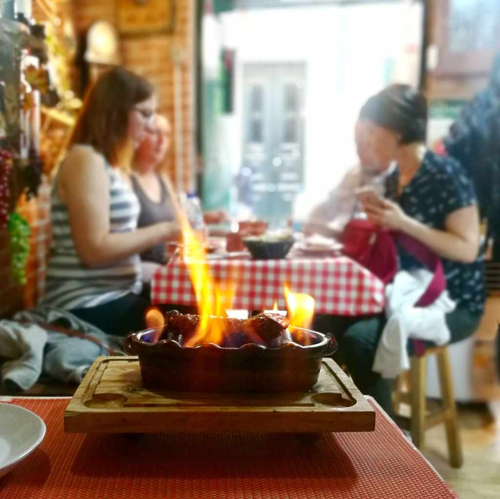 flammed sausage called chouriçoserved in our gourmet food tours in Lisbon at Treasures of Lisboa