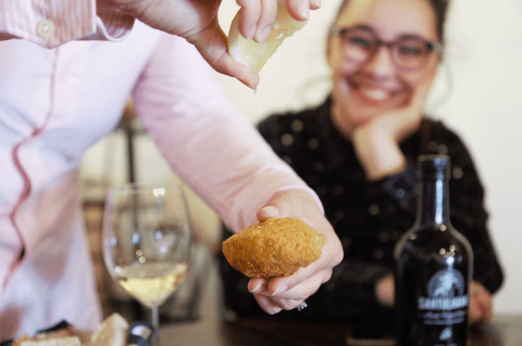 treasures of lisboa food tours in lisbon - pastel de bacalhau with lemon